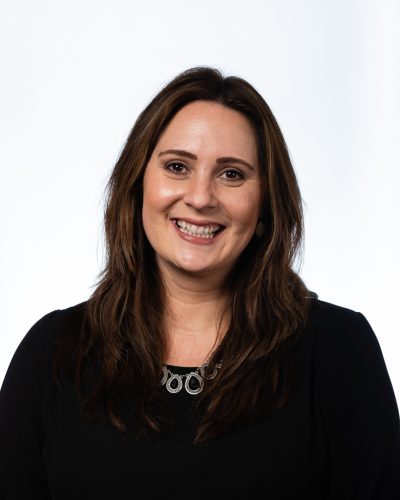 Professional headshot of Lori Croyle, Division Director at Beacon Hill Associates, part of Beacon Hill, a leading staffing and consultation firm. Lori leads staffing efforts focused on office support and administrative talent, helping businesses build high-performing teams with customized recruitment solutions.