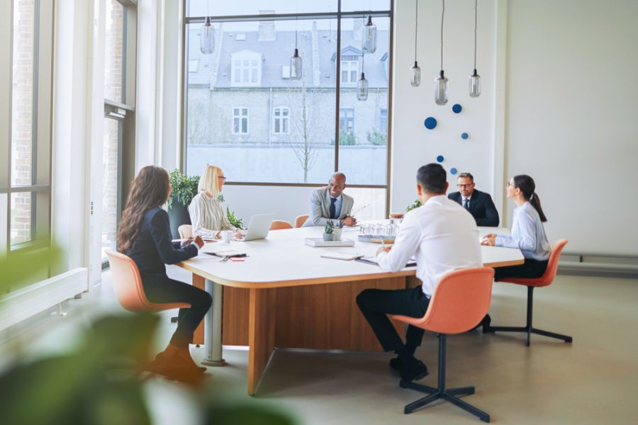 Legal recruiters from a legal staffing agency meeting to discuss hiring needs